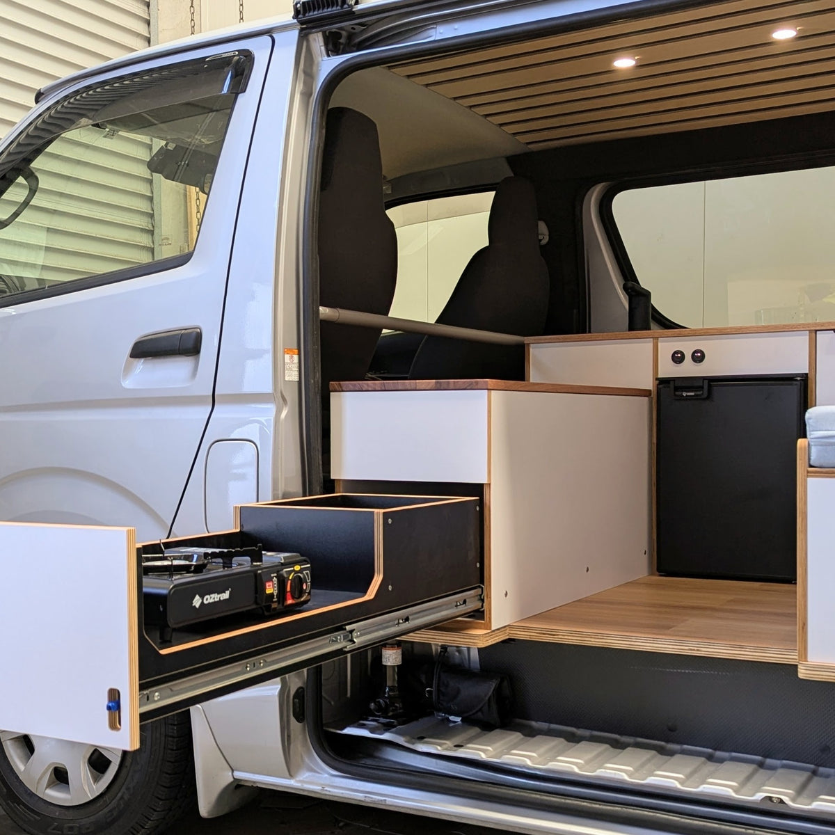 Side pull-out kitchen with butane stove and internal Bushman 50L DC50 fridge