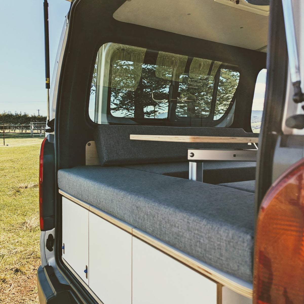 HiAce rear U-shaped lounge with Lagun table and under-seat storage